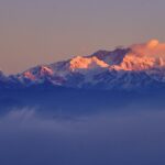 Witness the breathtaking views of the majestic Sandakphu Peak from Tumling, Nepal.