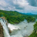 Relax while enjoying the peaceful views of Thusaragiri Waterfalls in Kerala, India.