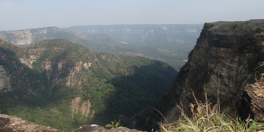 Scenic view of Balpakram National Park with diverse flora, fauna, and rugged terrain.