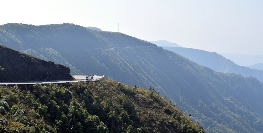 Scenic view of Meghalaya Hills, twisty road, lush greenery - places to visit in Meghalaya