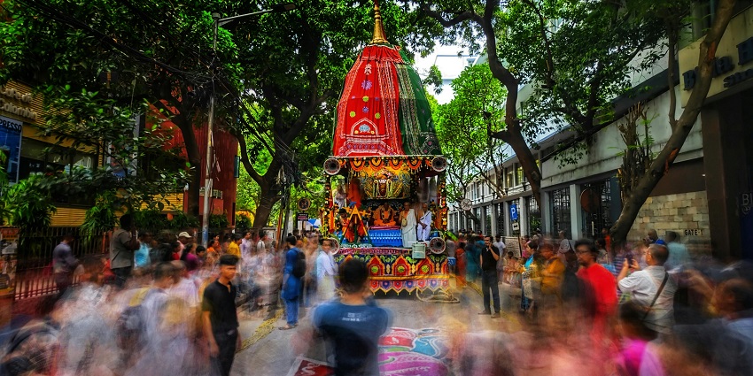 Rath Yatra celebration, showcasing the grand chariots and lively atmosphere dueing summer