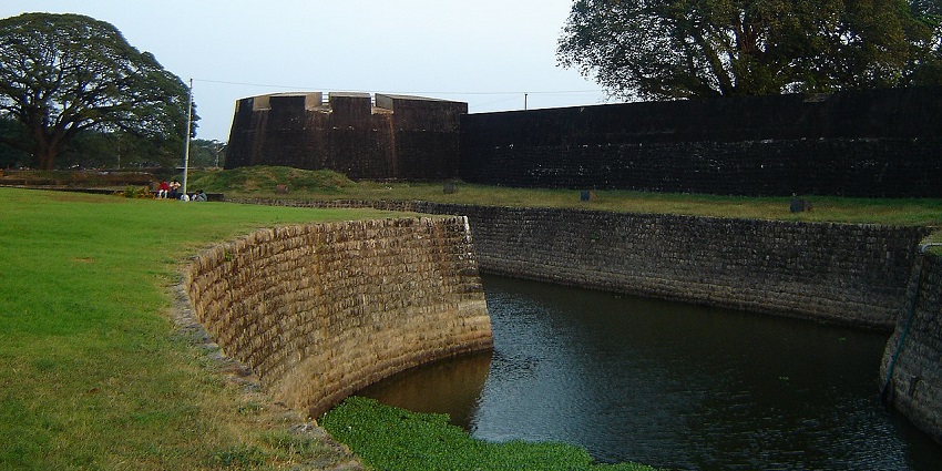 A scenic view of Tippu's Fort showcasing its historic architecture and lush surroundings.