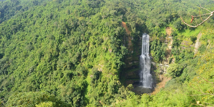 Vantawng falls in the middle of the hills and forest, water caseding through the rocks.