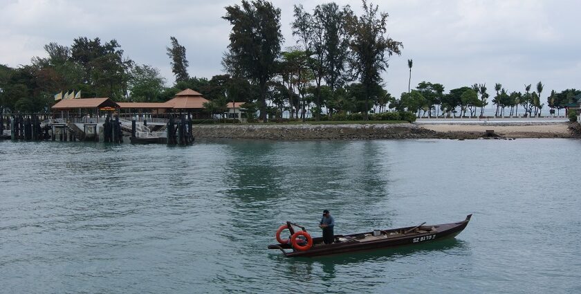 Image of Kusu Island, featuring serene beaches, clear waters, and lush greenery.