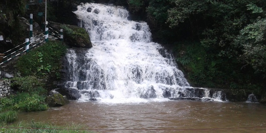 Elephant Falls in Shillong, Meghalaya, showcasing cascading water amidst lush greenery.