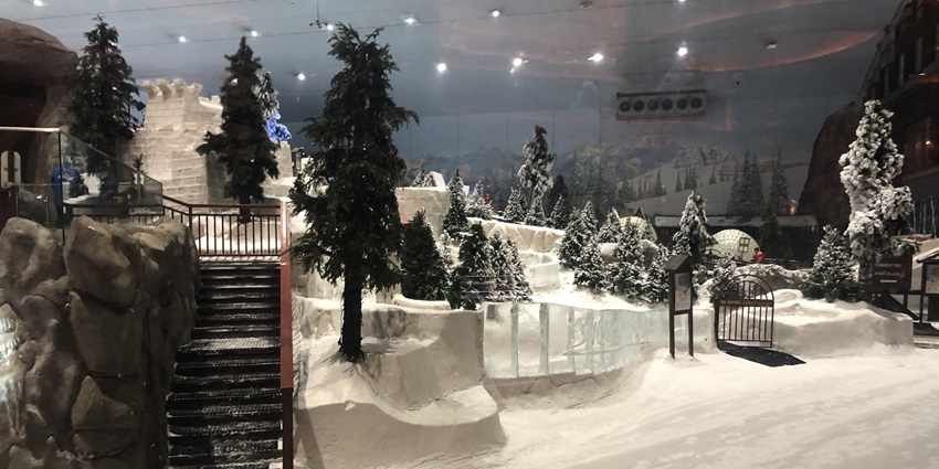 A picture taken inside the Ski Dubai with snow all around the place for skiing adventures