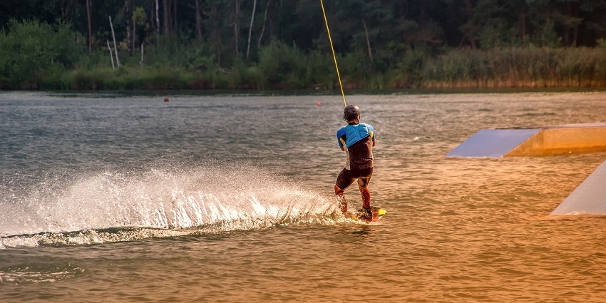 Wakeboarding, a combination of water skiing, snowboarding, and surfing, offers a great water sports in Maldives.