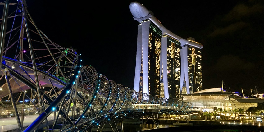 Walking the Helix Bridge at night is one of the best things to do in Singapore for all.