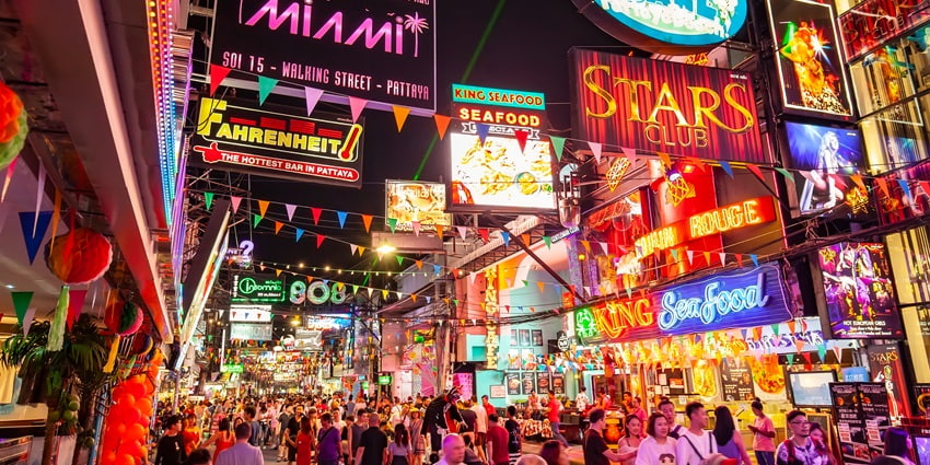 Explore the Scenic night view of the Walking street in the city of Pattaya, Thailand