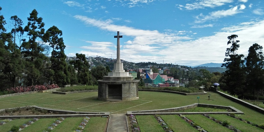 Cemetery with arranged graves, serene surroundings - places to visit near Khonoma Fort.