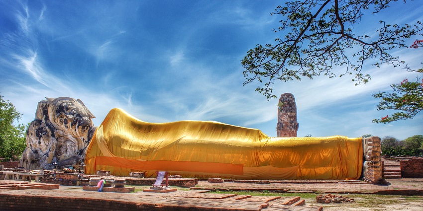 Snapshot of statue of the reclining Buddha in the historic city of Ayutthaya in Thailand