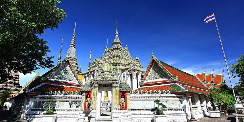 Wat Pho in Bangkok, home to the famous Reclining Buddha and intricate temple architecture.