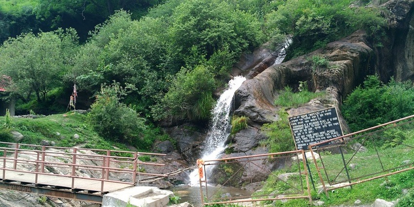 Panoramic image of the beautiful Waterfall amidst the lush green forest.