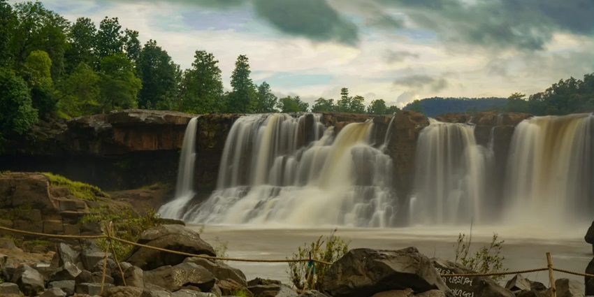 Picturesque view of waterfall during monsoon season - visit at the best time of the year.