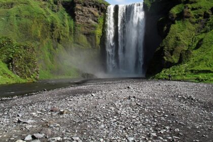 mage of a picturesque waterfall cascading through rock - Waterfalls in Ella.