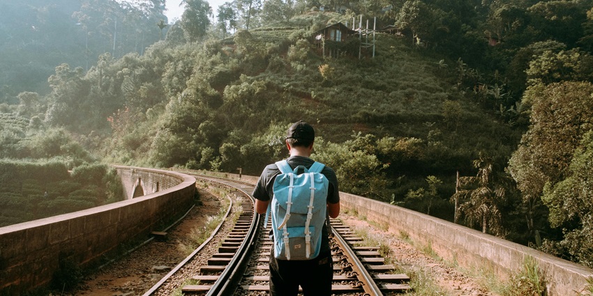 Train track passing through the jungle near the hiking trails–Hiking in Singapore