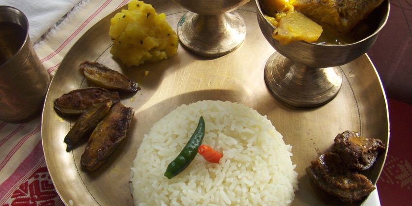 A view of a thali beautifully prepared with popular delicacies and flavours of Assam.