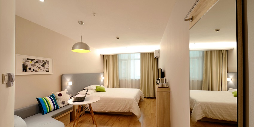 An image of a hotel room, an accommodation near the serene Mahanandi Temple.