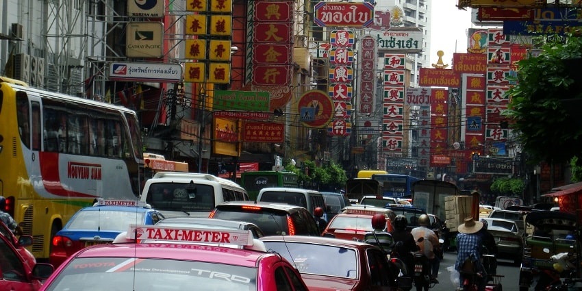 Savour the delicious street foods at Yaowarat Road, a thing to do in Bangkok with family.