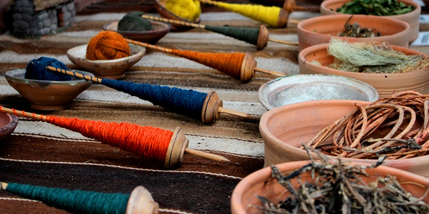 Click of yarns in different colours and multiple spices at a marketplace kept for selling