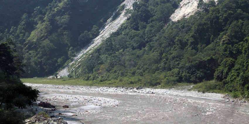 Enjoy a tranquil sojourn at Yumthang Chu River near Yumthang Valley in December.