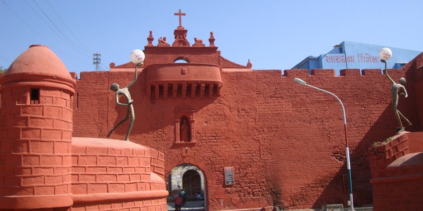 An image of the orange-coloured building of the Zampa Gateway, a tourist attraction.