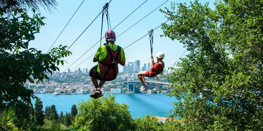 People flowing through the zip lining