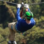 Scenic image of a man participating in the zipline adventure spot in E-O-D adventure park