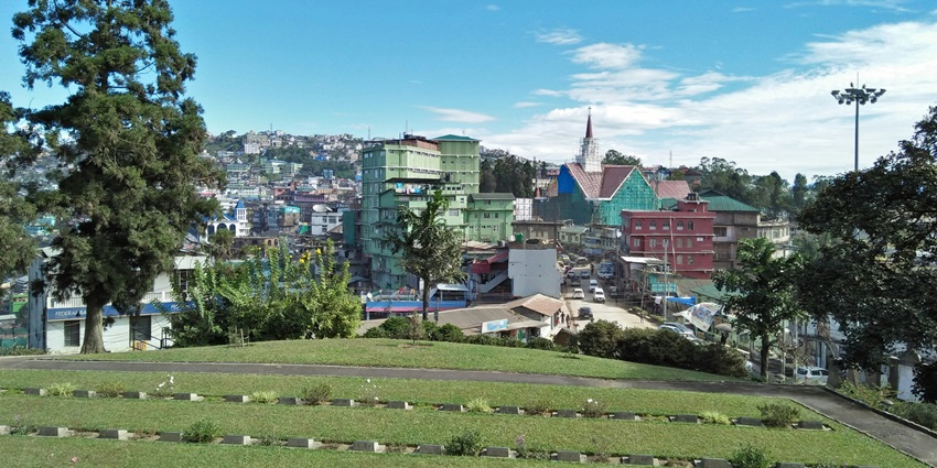 A view of houses surrounded by greenery in Kohima, a place near Intanki National Park.
