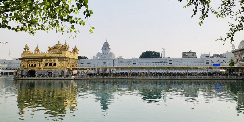 Snapshot of the Holy Sarovar of the Golden Temple with the golden dome of temple in the background