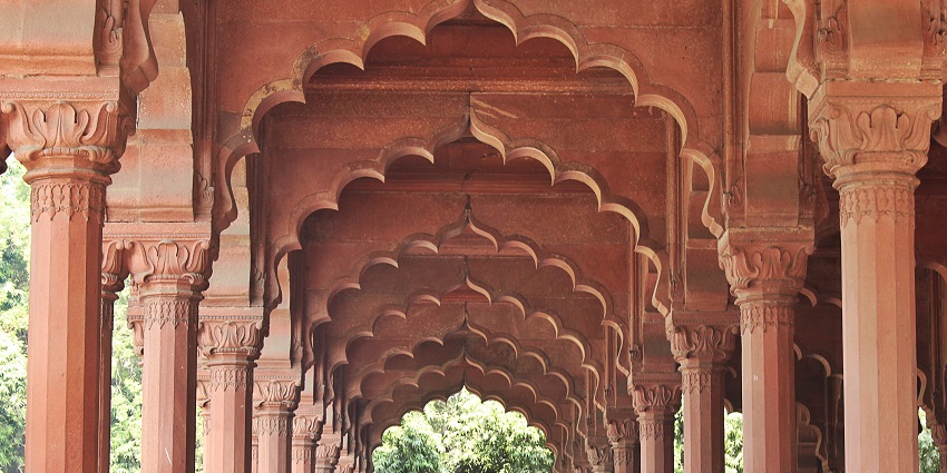 Beautiful archways in the halls of the fort, surrounded by lush greenery