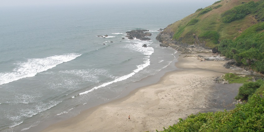 Achara Beach near Tarkarli is perfect for birdwatching and relaxing with the scenic ocean view.