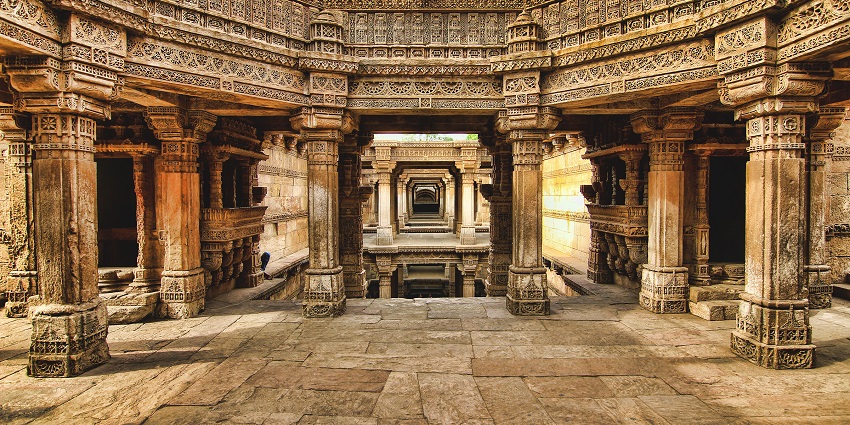 Entrance to Adalaj Stepwell, showcasing intricate carvings and architectural beauty