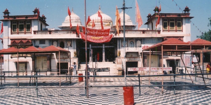 Adhar Devi Temple, dedicated to Durga, features rock-carved architecture.