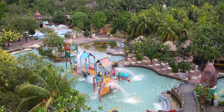 Aerial view of a swimming pool and the various water rides in Amusement Park–places to visit in Anjuna