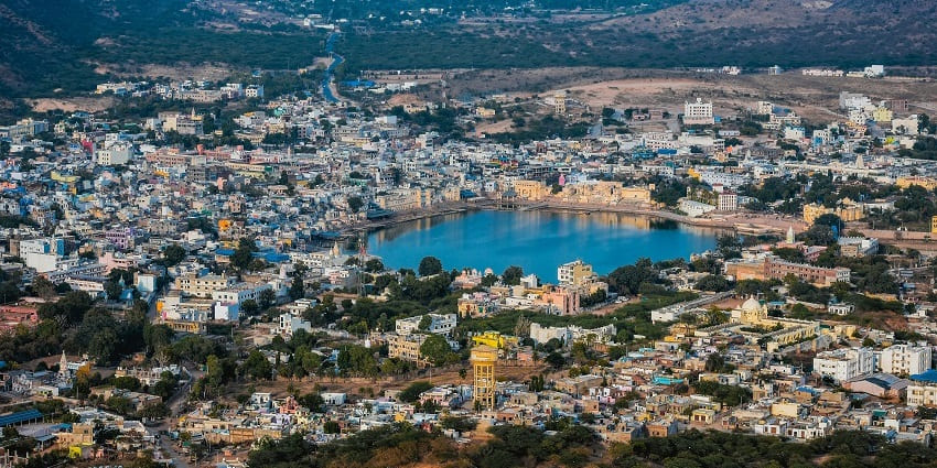 Aerial view of Pushkar, showcasing its vibrant streets and scenic landscapes.