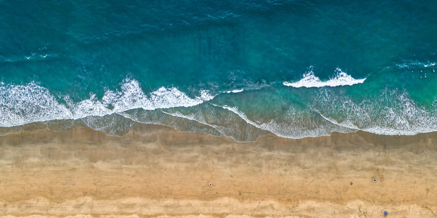 A bird’s eye view of Agonda Beach, one of the top places to visit near Palolem Beach.