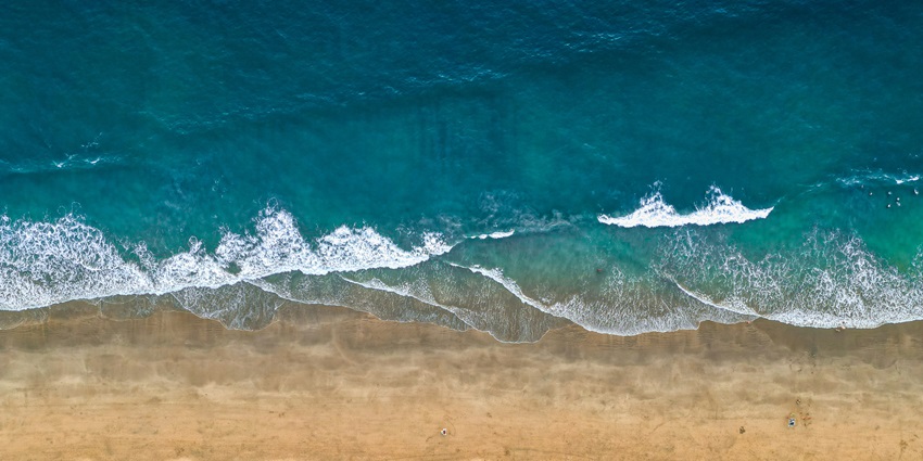 Pristine and peaceful Agonda Beach, ideal for sunbathing and yoga in South Goa.