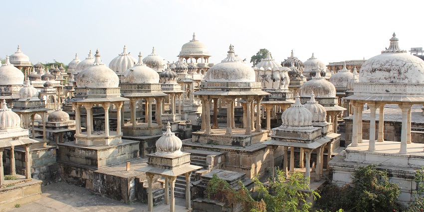 Historic stone cenotaphs at Ahar, Udaipur, featuring intricately carved domes and pillars