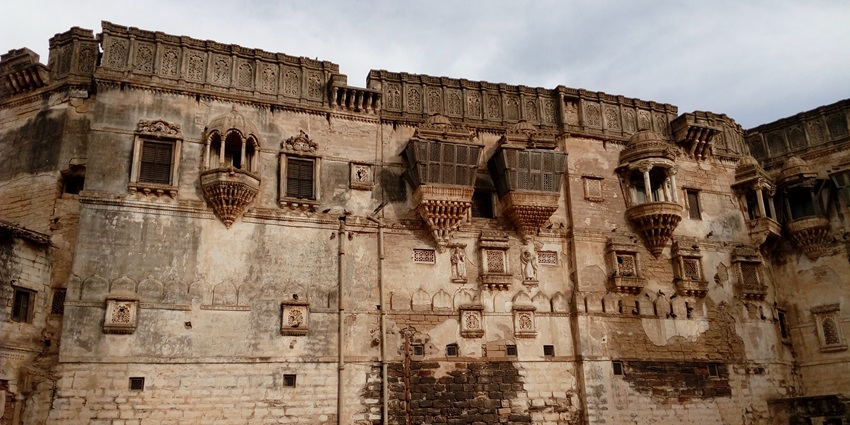 Explore the unique architecture of Aina Mahal known for its intricate carvings and designs.