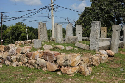 A picture of the remains of a fort in Rajasthan with multiple stupas placed