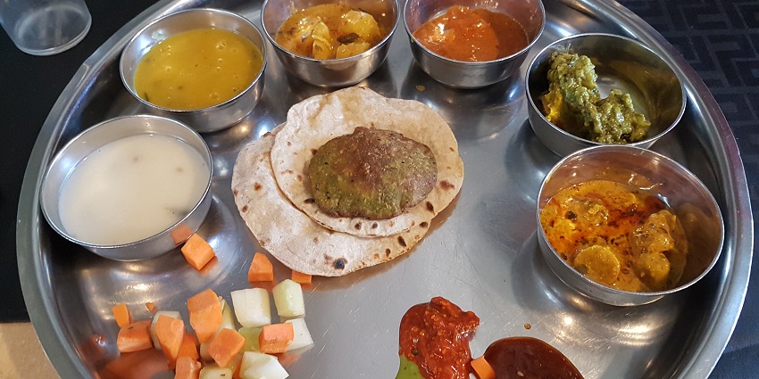 Vegetarian Gujarati thali at Akshardham offers the best food in Gandhinagar