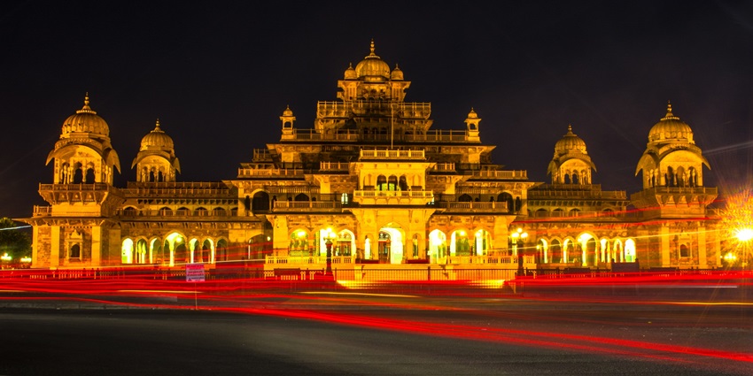 Albert Hall Museum illuminated in golden light against Jaipur's night sky–sheesh mahal nahargarh fort