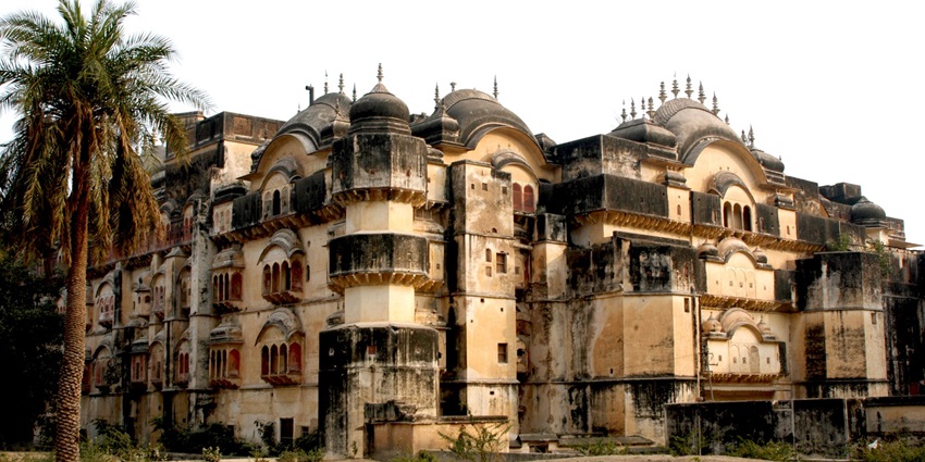 A glimpse of the iconic Alwar Palace showcasing artistic designs and rustic charm.