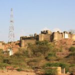 The view of Amagarh fort perched on a hill in Jaipur is a scenic sight to behold