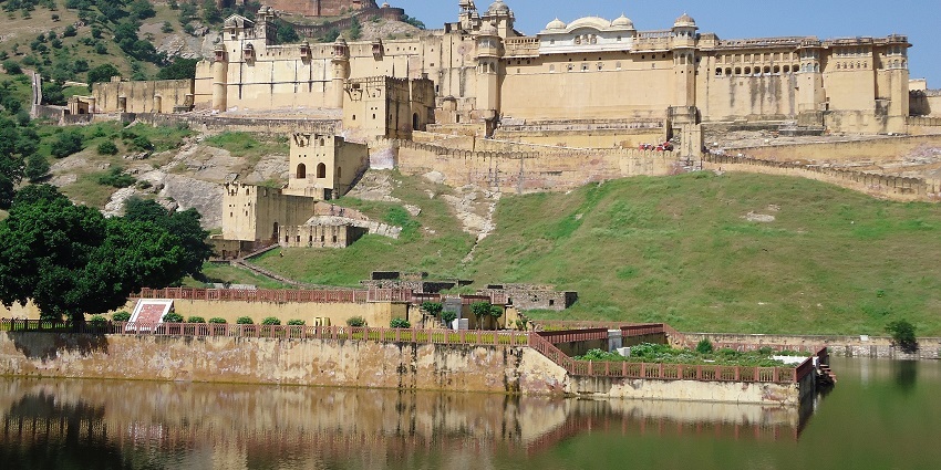 A wide angle view of the Amber Fort from the beautiful lake. It is one of the most iconic forts in Jaipur