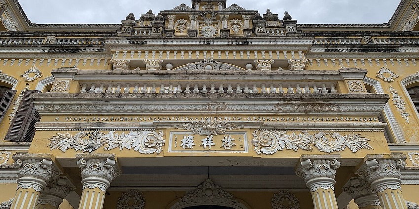 The An Dinh Palace facade showcasing the grandeur of imperial Vietnamese design.