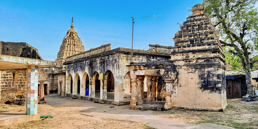 Ancient Anchaleshwar Mahadev Temple by Wardha River, spiritual retreat.