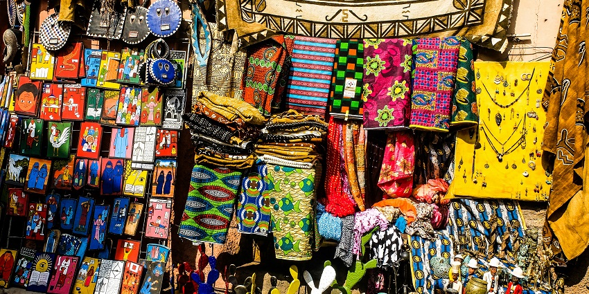 Shopping colourful handicrafts at Anjuna Market, one of the best things to do in Anjuna.