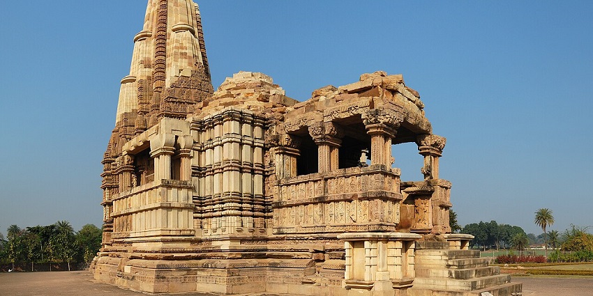 The Annapurna Temple has intricate carvings set against a bright blue sky backdrop